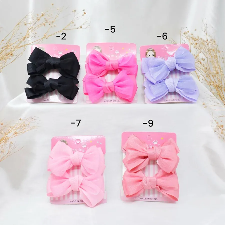 Moñitos dobles infantiles en tarjeta, varios colores